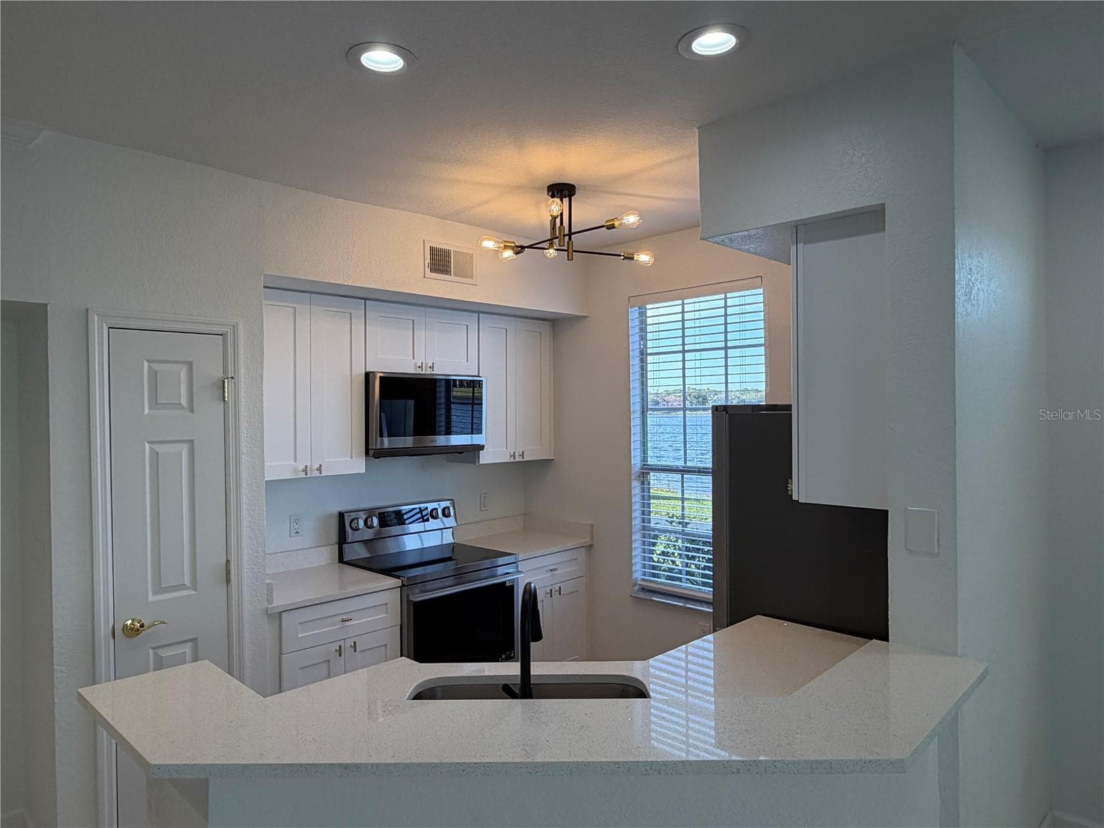 9818 Lake Chase Island Way #9818 photo 4