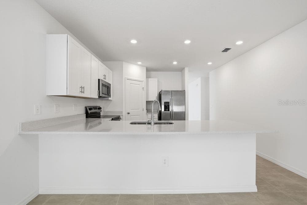 13502 Tropical Breeze Way