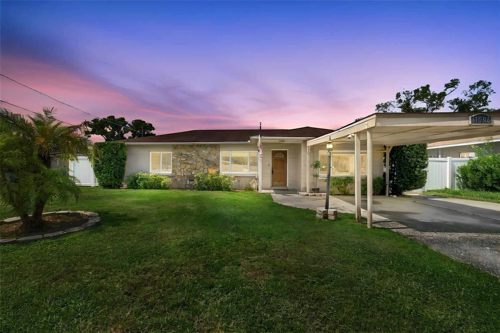 11006 N Oakleaf Ave photo 1